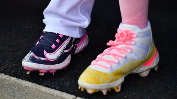 View of the cleats worn by Mookie Betts and Chris Taylor.
